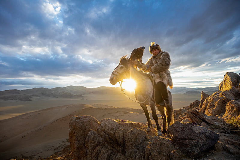 A Kazakh Eagle Hunter with his eagle from Altantsögts district of Bayan-Ölgii Province in western Mongolia.